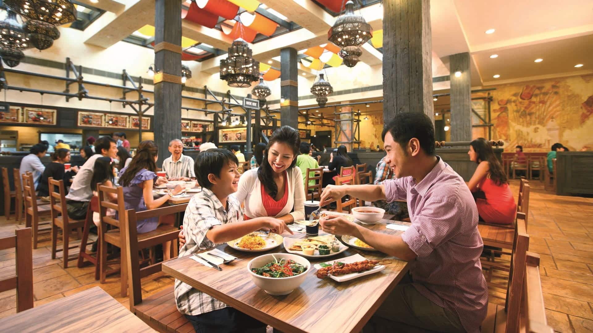 Family dining at Oasis Spice Café USS