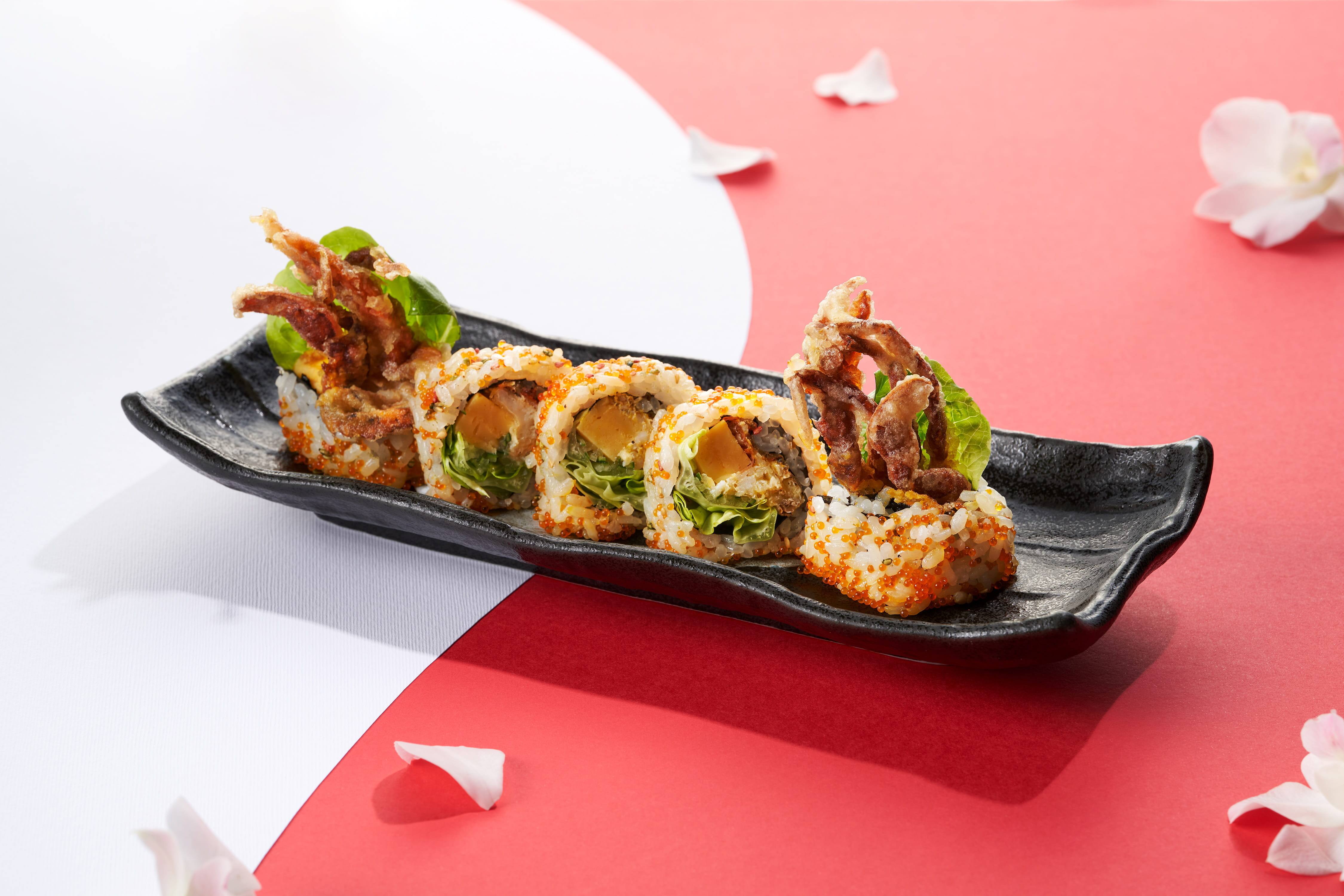 The SG61 à la carte selection includes six kinds of assorted Japanese seafood sashimi at SGD61, Chilli Crab Maki at SGD28, Hainanese Chicken Rice Donabe at SGD58, Grilled Whole Silver Pomfret with sambal miso butter at SGD78 and Pandan Custard Pudding at SGD12.