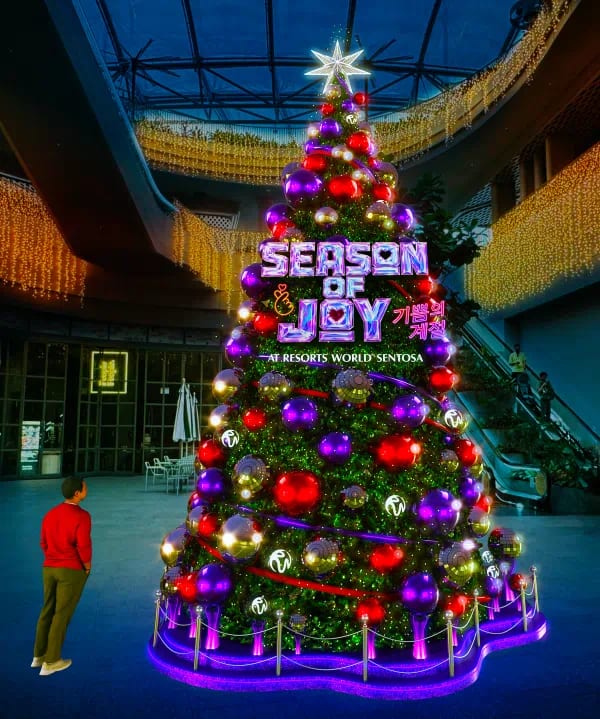 Season of Joy - Resorts World Sentosa - A shimmering eight-metre Christmas tree anchors the celebrations, surrounded by Season of Joy installations across the precinct.