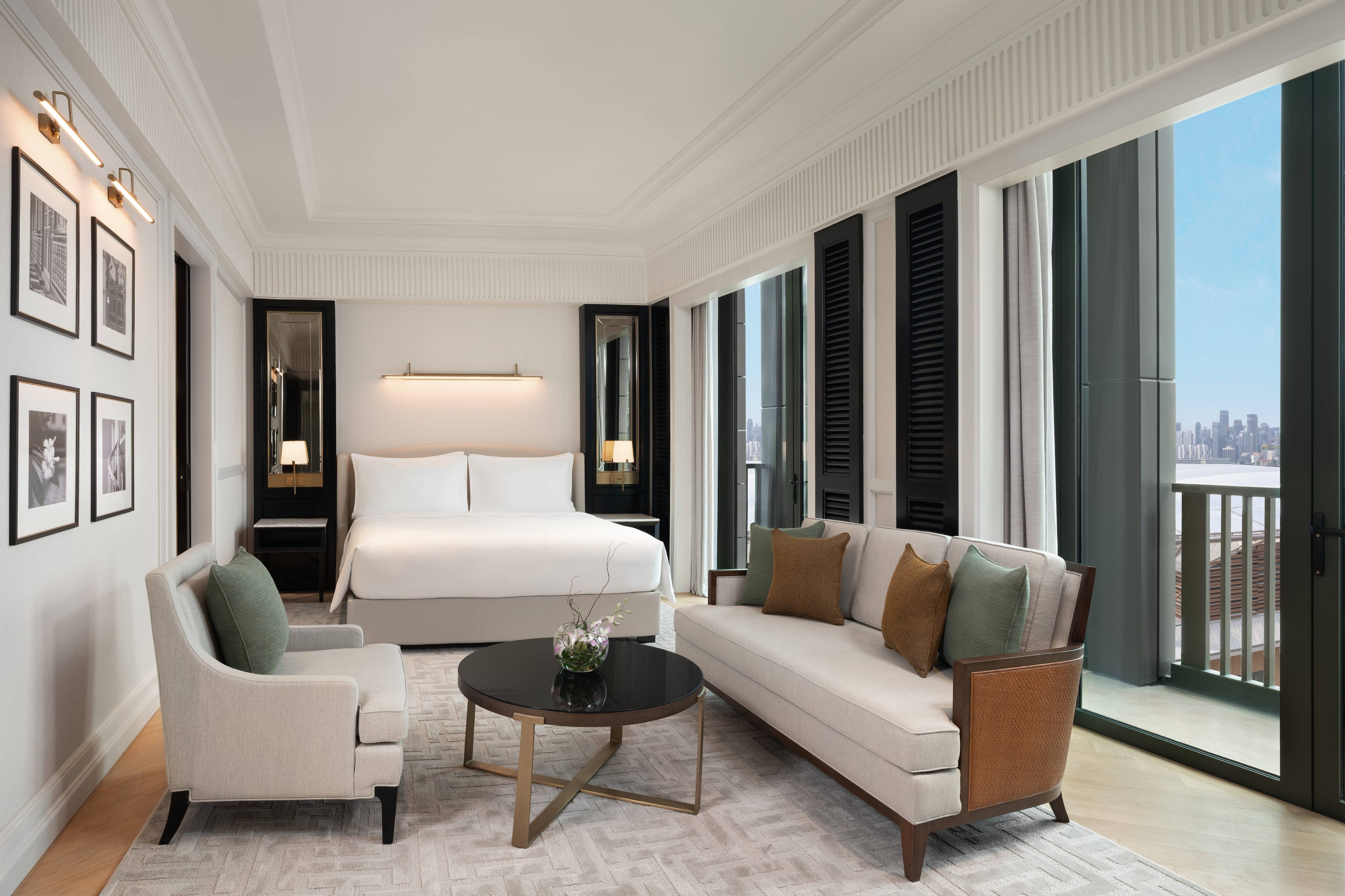 The suite collection at The Laurus includes 72 sqm Deluxe and Premier suites, pool-view and accessible options, a 115 sqm Grand Luxury Suite and a 172 sqm Presidential Suite. 