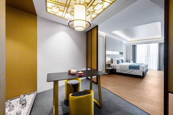 At Crockfords Tower, Deluxe Suites offer a king bed or two super-single beds; the Premium Suite and Mansion have a king bed.