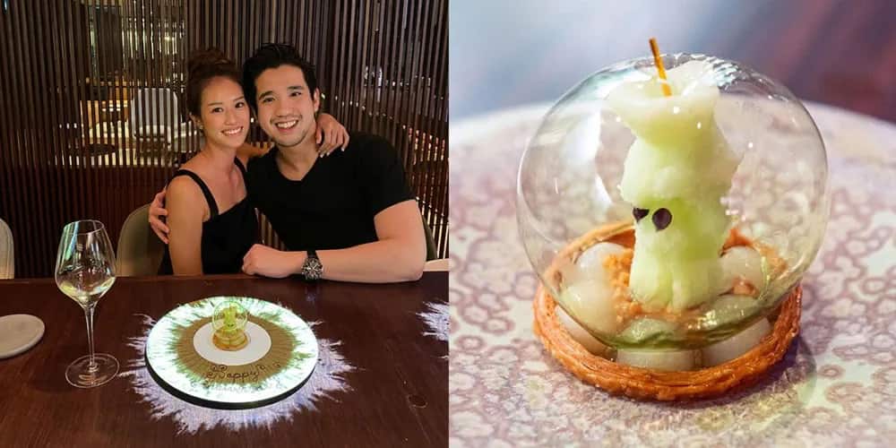 Jiamin Yang and Lennard Yeong with a picture of an apple dessert
