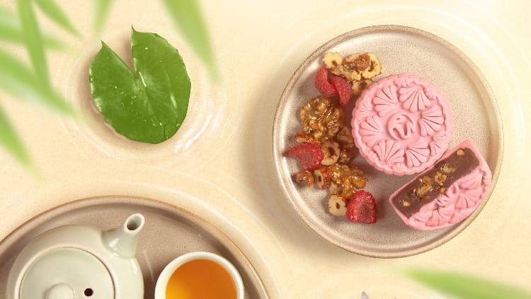 Raspberry snow skin mooncake with red jujube paste and walnut and dried logan